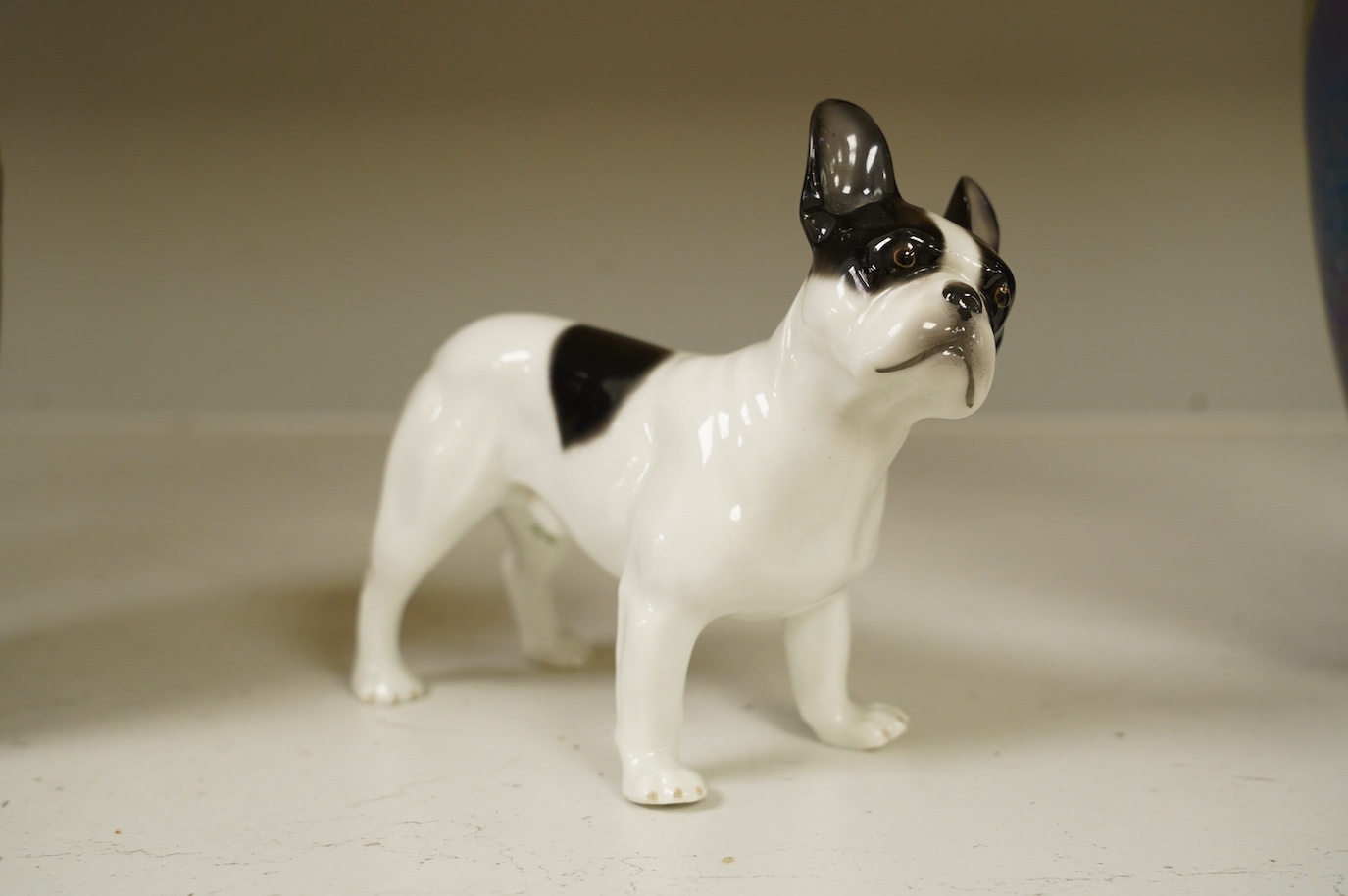 Heubach Kunst Porzellan, a standing French bulldog, 14cm high. Condition - good